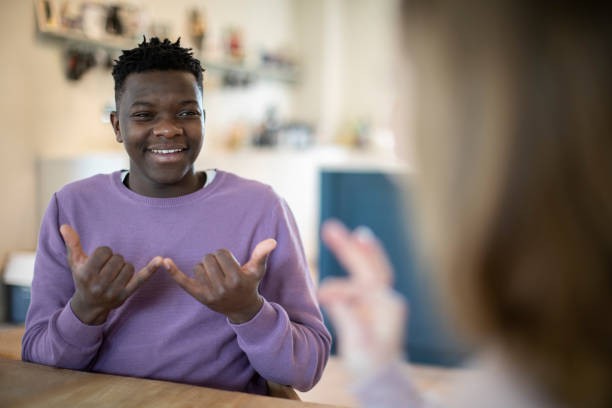 Deaf Teen signing