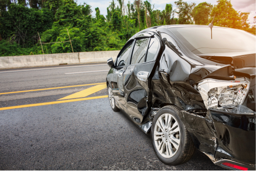 black car crashed on the road - crash course - highway safety office