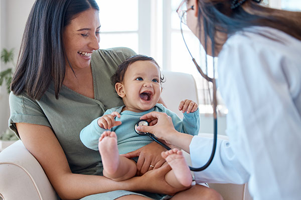 mom and baby with nurse